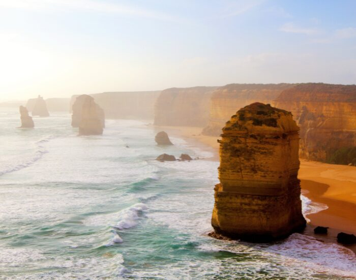  big rock formations on a beach at Port Campbell National Park 