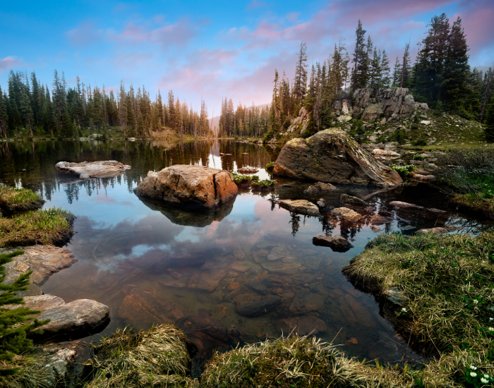 Grand-County-alpine-lake.webp alpine lake panoramic view of gran county