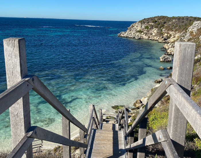 rottnest-island.webp panoramic view of a beach and a cliff in Rottnest Island