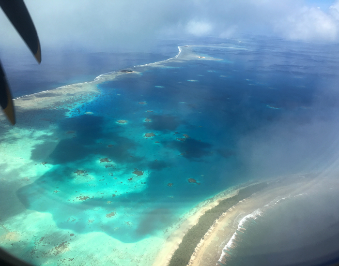 tuvalu.webp aerial photo from a plane window of tuvalu island