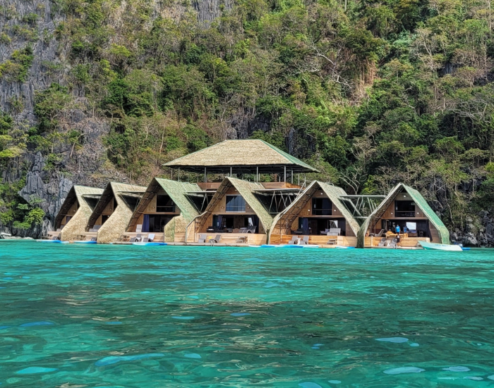 Houseboat-in-philipines.webp House boats in the philippines with crustal clear waters