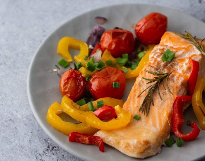 baked-arctic-char-salvinia-underwater.webp baked Arctic char with vegetables served on a plate