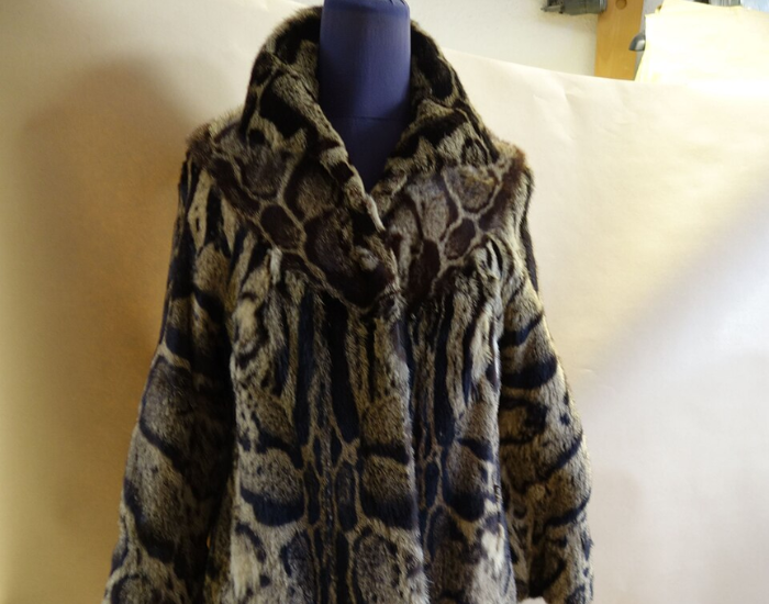clouded-leopard-coat.webp clouded leopard coat