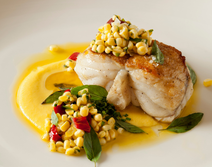 a monkfish steak on served on a plate