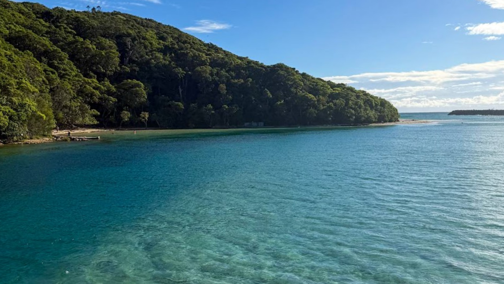 panoramic view of burleigh creek and burleigh heads national park on the background